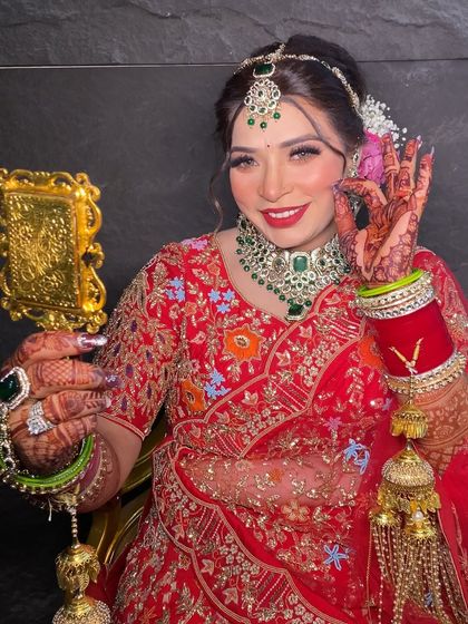 A happy and radiant bride. The makeup is designed to enhance her natural glow.