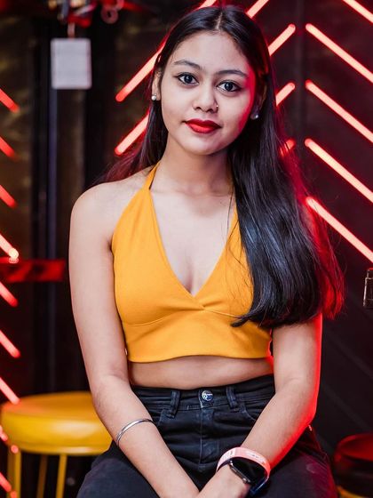 A guest posing at the bar.