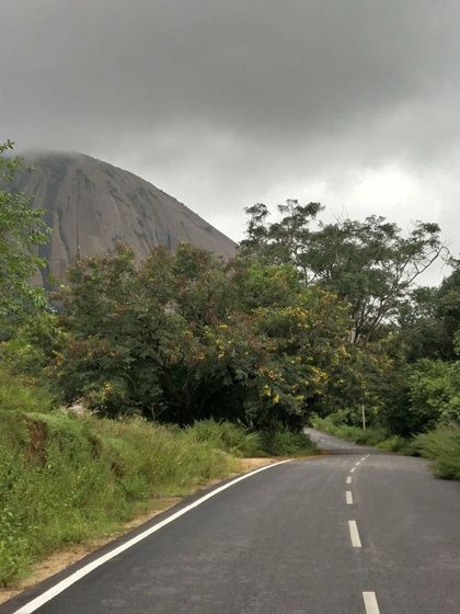 The majestic Savandurga monolith looms in the distance on our 'Reservoir Dogs' ride. The route through the state forest is a highlight.