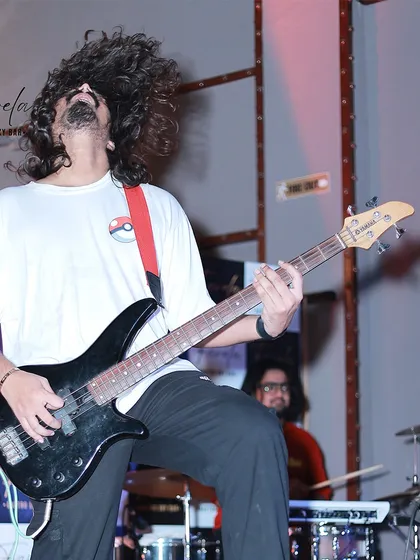 Our bassist, Sourabh, lost in the music, hair flying. This is the kind of unrestrained performance energy that gets a crowd headbanging along with us.