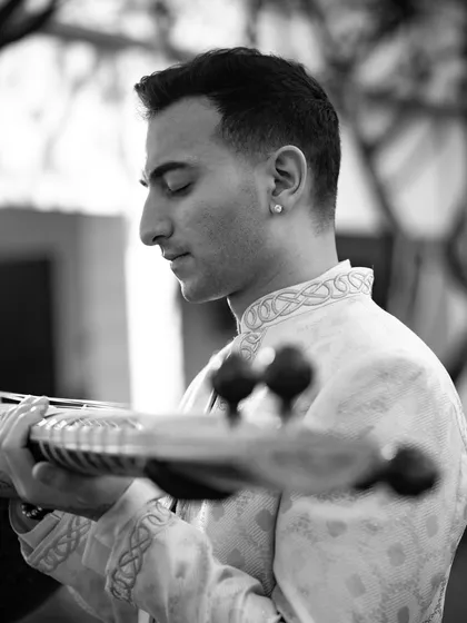 A black and white profile, capturing a moment of serene focus. Sometimes, stripping away color brings out the pure emotion.