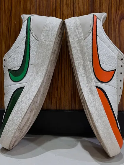 The back view of the customized Nikes, showing the clean, solid color blocks I added to the heel. This detail completes the transformation and ties the whole design together.