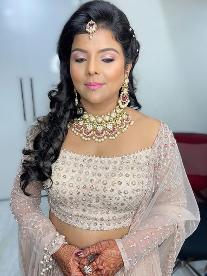 A closer look at the soft pink eye makeup and glowing skin, proving that beauty is ageless.