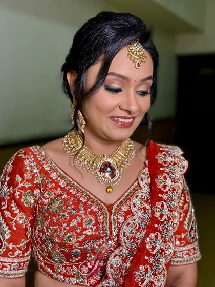 An eyes-closed shot showing the beautiful eye makeup. The subtle green liner on the lower lash line adds a unique touch to the look.