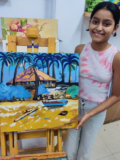 The final result of a tropical landscape painting. This student successfully captured the vibrant colors of a beach scene with our guidance.