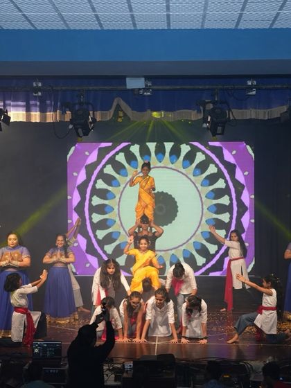 Our 'Devi Maa' prayer act from the 'Tarulya' 2025 showcase. This performance blends traditional themes with gymnastic pyramids, creating a culturally rich and visually stunning piece.