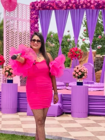 A full view of the stunning purple and pink stage for the Haldi. I love when families choose unconventional color palettes to make their event stand out.