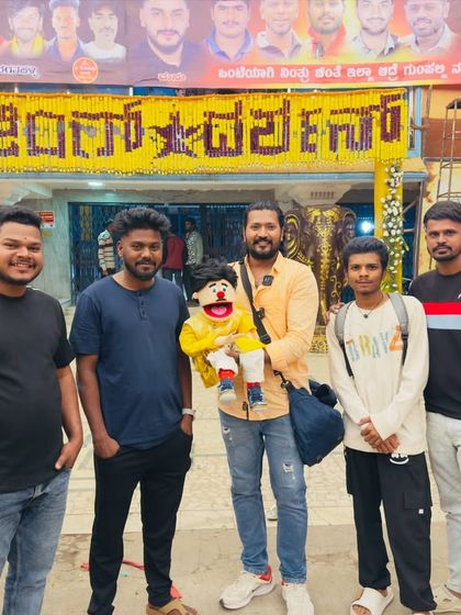 Posing with my puppet Lucky and a group of fellow movie lovers. My goal is to make film promotions a fun, shared experience for everyone involved.