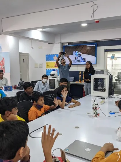 A demonstration of a VR headset during a community meetup. We explore a wide range of technologies beyond just robotics, including virtual and augmented reality.