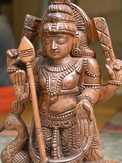 A close-up of the upper body of the 24-inch Murugan statue, showing the intricate ornamentation.