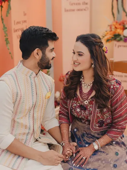 A candid close-up of the couple, their smiles showing how much they loved their personalized decor.