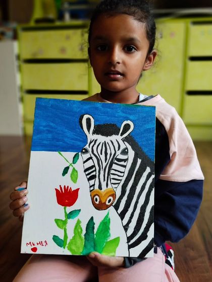 This exhibition-worthy zebra painting took two hours of patience, focus, and lots of fun. I love guiding my students to create art they can be truly proud of.