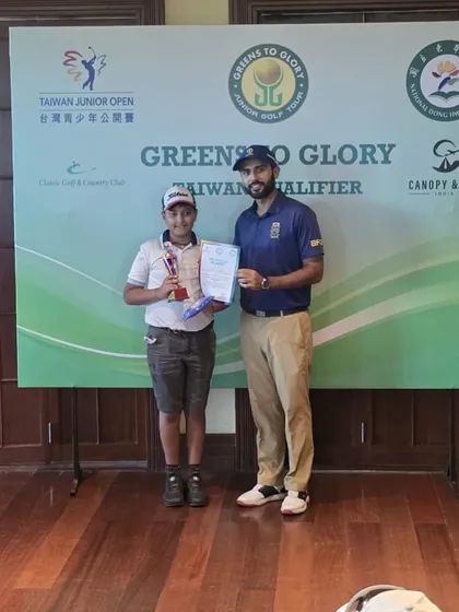 Shauryaveer Behera receives his 3rd place award at the Greens to Glory Junior Golf Tournament.