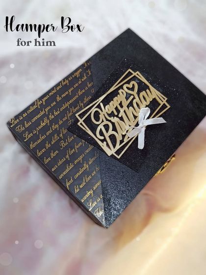 This black vintage-style hamper box is perfect for him. The gold script and glittery finish make it feel both classic and celebratory.