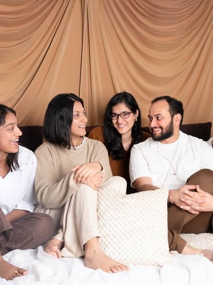 Candid laughter and conversation during an extended family shoot. These are the moments that truly reflect the joy of being together.