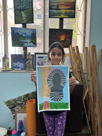 Art can carry a powerful message. This piece, showing a large bootprint in a field, is a creative exploration of perspective and human impact on nature.