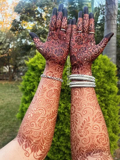 A beautiful outdoor shot showcasing the rich, dark stain. The color looks incredible in the natural light, highlighting every detail of the floral design.
