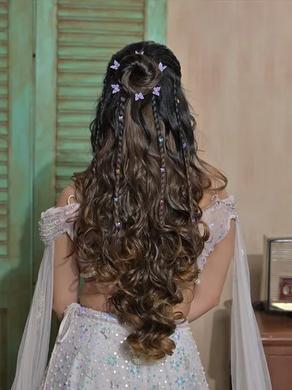 Another angle of the butterfly hair, perfect for a fun and youthful Mehendi or Sangeet look.