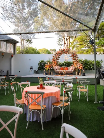 Explore the charm of The Backyard by FHC. These images showcase various setups for intimate events, from wedding ceremonies under a transparent canopy to lively birthday parties and elegant engagements. This space is designed for close-knit celebrations.