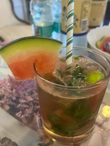 A refreshing watermelon mojito, perfect for a summer party or daytime event. We use fresh, seasonal fruits in our drinks.