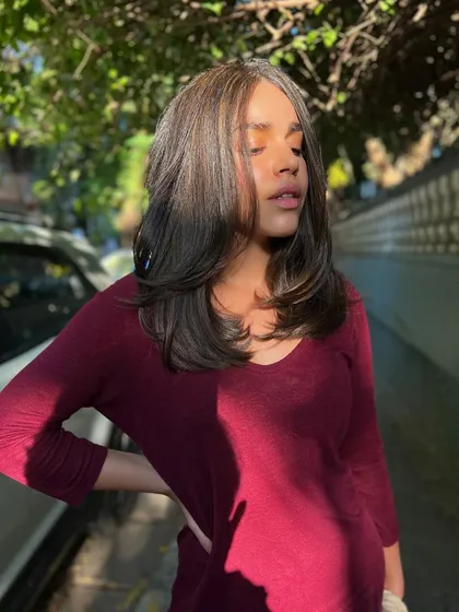 This shot shows the beautiful movement and subtle color variation in her hair. The goal was healthy, glossy hair, and we definitely achieved it.