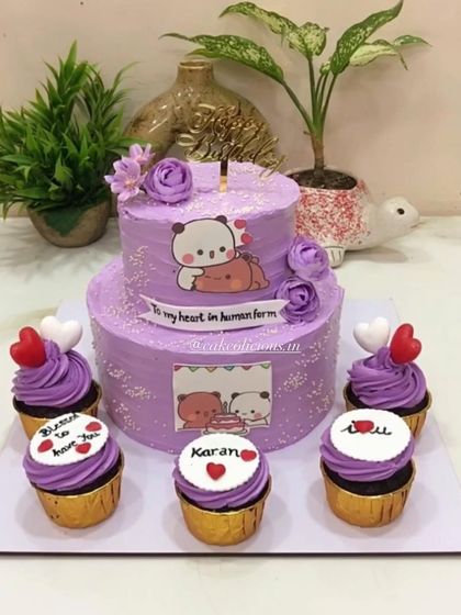 A super cute Bubu-Dudu themed cake ordered by a bride for her groom's birthday, which was also their wedding day. This two-tier lavender cake was accompanied by five matching cupcakes with personalized messages.