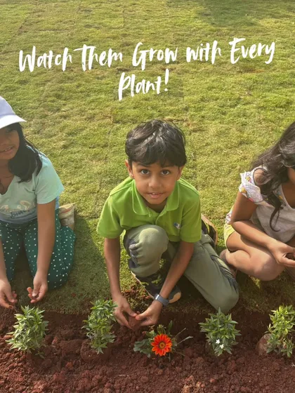 This photo captures a beautiful moment of a young boy carefully planting a flower. I believe teaching children how to nurture a plant teaches them responsibility and patience. It is wonderful to see them watch their own plant grow over time.