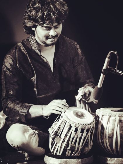 An old photo from a performance at UB City, showing my early days as a performer.