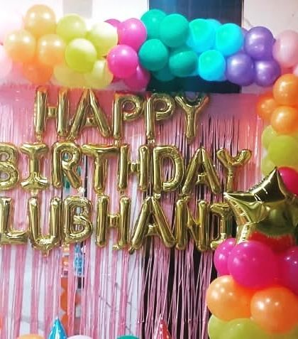 A close-up of the personalized "Happy Birthday Lubhani" foil balloons. I can customize the name for any celebration, making the person of honor feel extra special on their day.