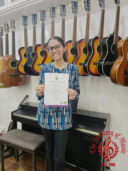A big round of applause for Alicia Fonseca. We're celebrating her fantastic achievement in her Grade 7 Electronic Keyboard examination, where she earned a solid 77 out of 100.