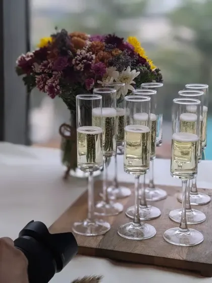 Glasses of sparkling champagne ready to be served at the Varnya salon launch. A touch of celebration to welcome guests and toast to a new beginning.
