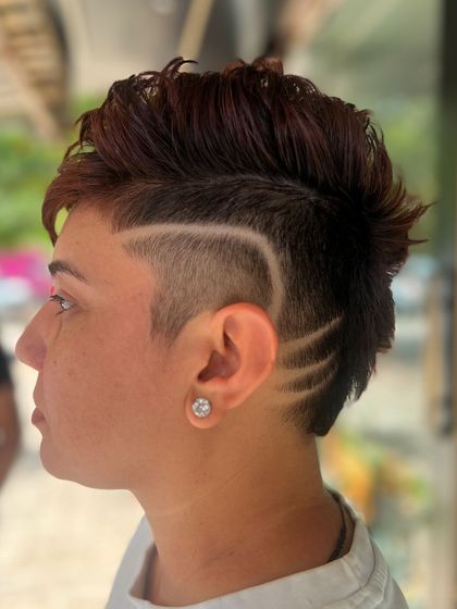 The final look of the hair tattoo from a different perspective. This style is all about expressing individuality and confidence.