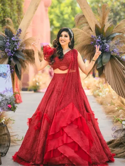 A fun, happy shot of the bride at her engagement. Her makeup is a perfect balance of elegance and drama, making her shine.