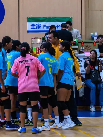 A mid-game huddle with the coach. These moments are crucial for adjusting our strategy and keeping the team motivated.