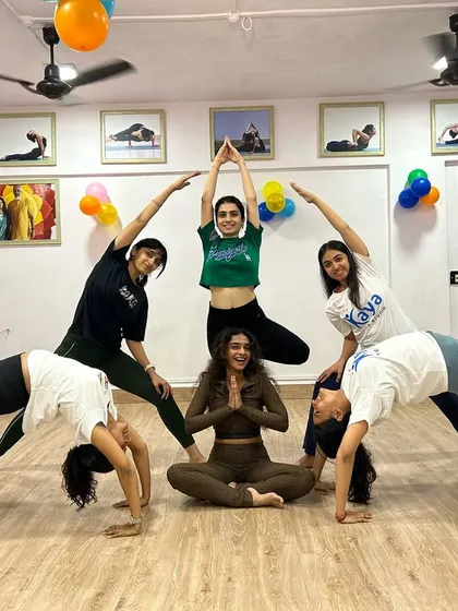 This is our Kaya Family. We support, lift, and grow with each other, creating beautiful shapes and even better friendships on and off the mat.