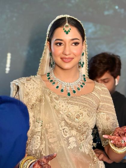 A beautiful shot of the bridal model from my masterclass, capturing the flawless makeup and the stunning Anamika Khanna outfit.