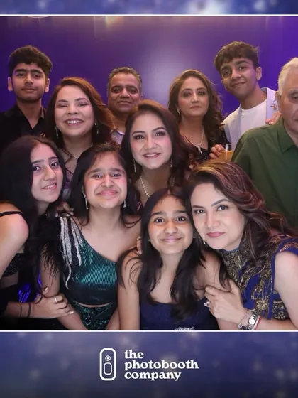 A beautiful multi-generational family portrait taken at a cocktail party. Our photo booth is a wonderful way to get a rare, cherished photo of the entire family together during a celebration.