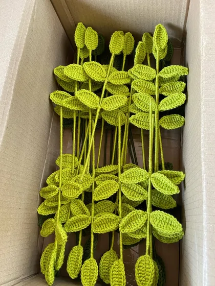 A box filled with just the green leaves and stems, an essential part of every flower order.