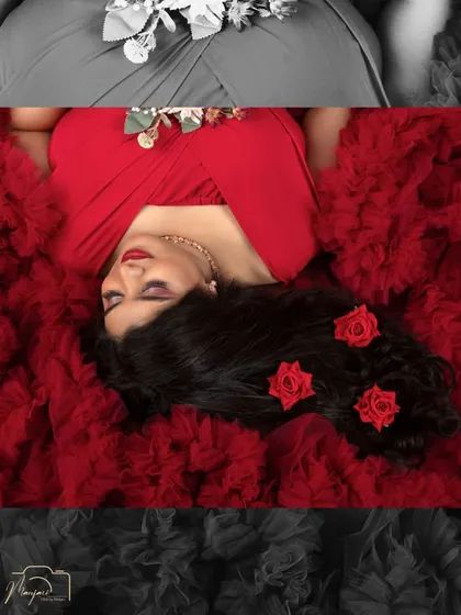 An artistic edit combining color and monochrome to highlight the serene beauty of the sleeping pose. The red roses in her hair add a touch of romance to this creative portrait.