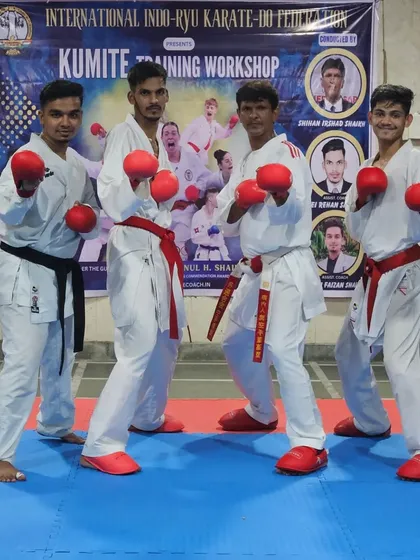 Our team of kumite athletes posing for a photo during a training workshop. We are ready to take on any challenge, together.