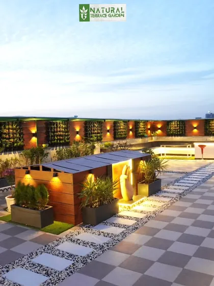 Another wide shot of the Palam Vihar terrace, highlighting the multiple seating areas and decorative features that make the space perfect for large gatherings.