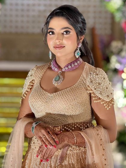 A classic portrait of the bride, her makeup looking clean and precise, enhancing her natural beauty.