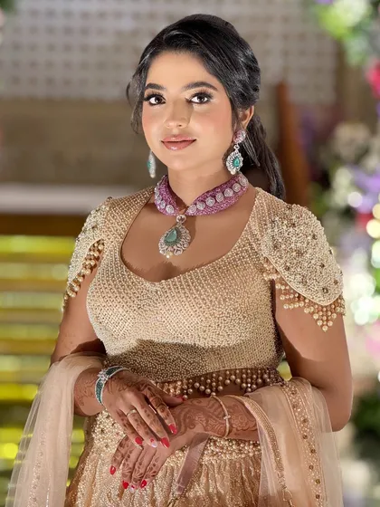 A classic portrait of the bride, her makeup looking clean and precise, enhancing her natural beauty.