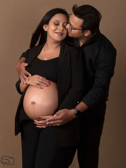 Another beautiful, intimate moment of the couple embracing. The simple background allows their emotion to shine.