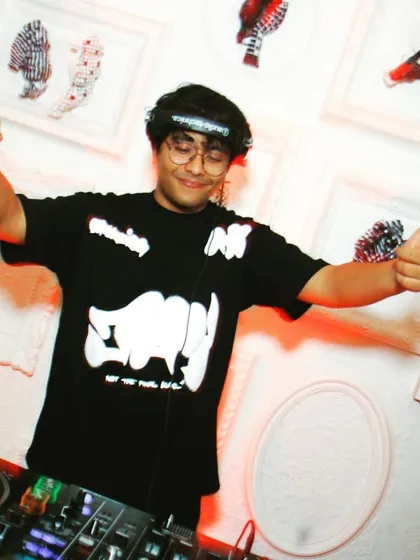Another shot of me in my element, pointing to the crowd and sharing the vibe. It's all about creating a fun, interactive party.