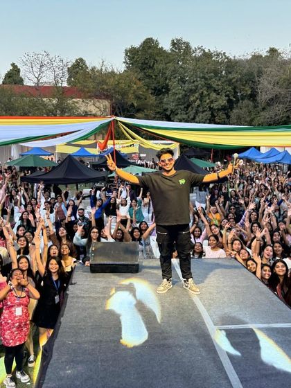 The peace signs say it all. A fantastic shot with the entire crowd at a Delhi University fest, all of us sharing a moment of pure musical joy.