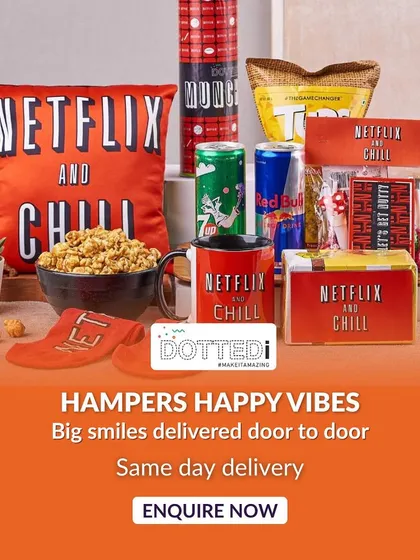 Here is my signature "Netflix and Chill" hamper, a bestseller for a reason. It's packed with gourmet popcorn, energy drinks, a comfy cushion, and other fun snacks, creating the ultimate binge-watching experience right out of the box.