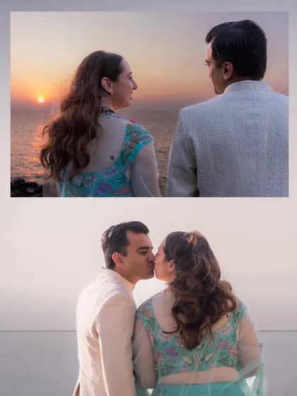 A couple shares a kiss and a quiet moment watching the sunset over the Arabian Sea from their hotel. A perfect end to a day of celebration.
