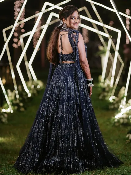 A back view of the Sangeet ponytail, showing the intricate details and how it flows beautifully down the back.