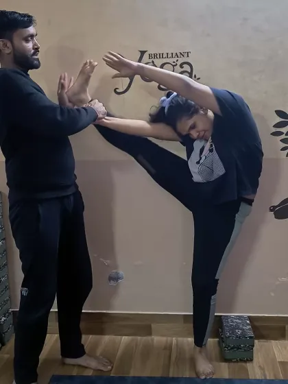 The focus here is on the side-body stretch and hip opening in a variation of Trivikramasana. We teach multiple variations to suit different levels of flexibility.